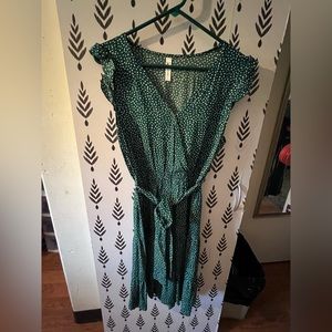 Green and white polka dot dress. Large knee length.